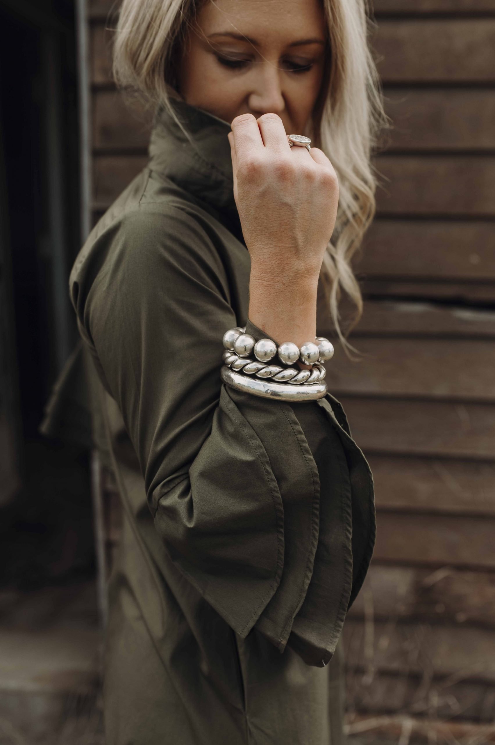 Cristyl wears the 925 Sterling Silver ball bracelet in 18mm balls, 925 Chunky Sterling Silver twisted golf bangle, 925 Sterling Silver plain chunky golf bangle and 925 sterling silver coin ring.